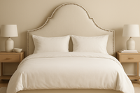 The Mayfair Headboard with white bedding in a bedroom setting.